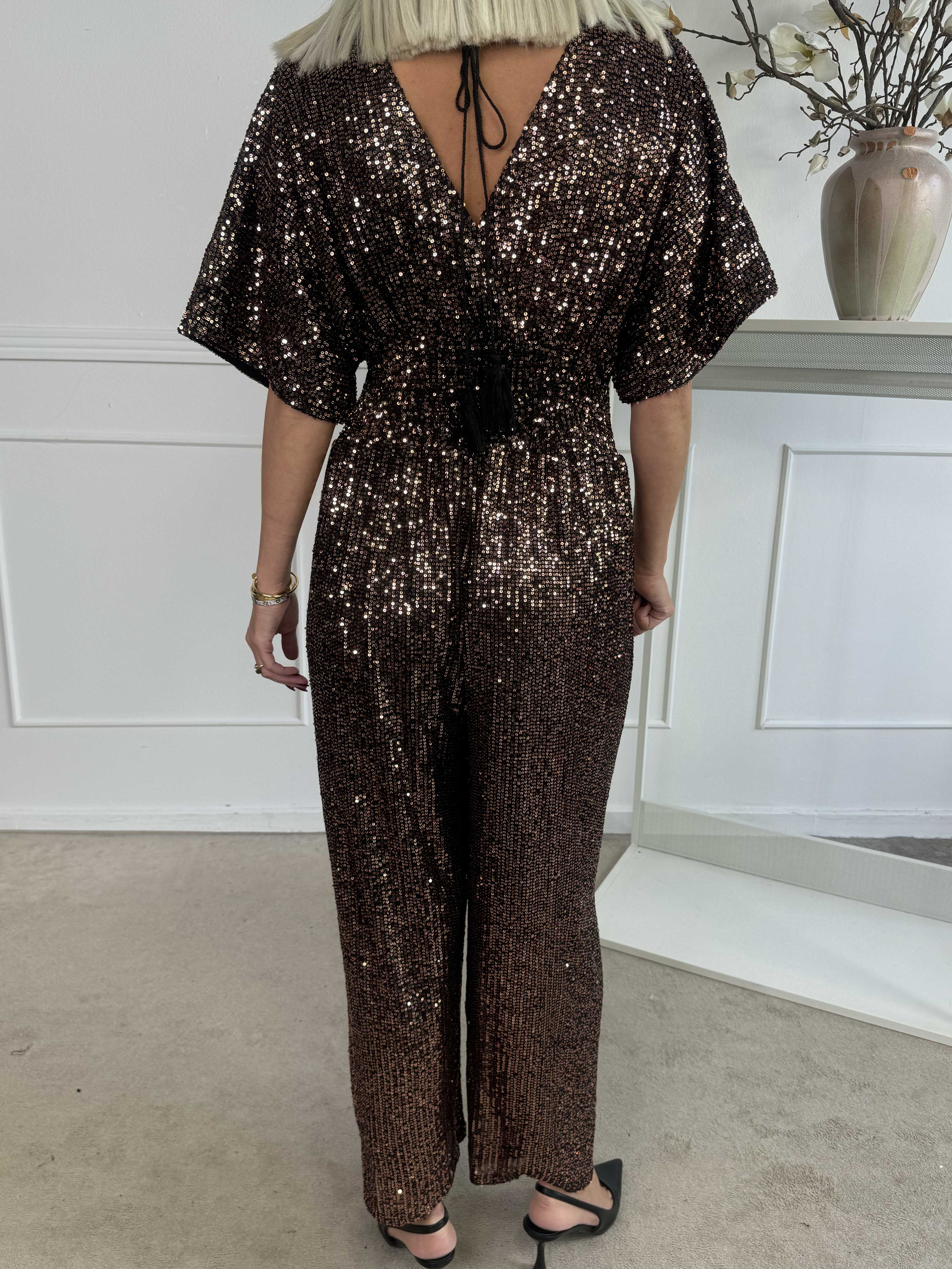 Pams Glitter Jumpsuit - Elastisk jumpsuit med smock och paljetter